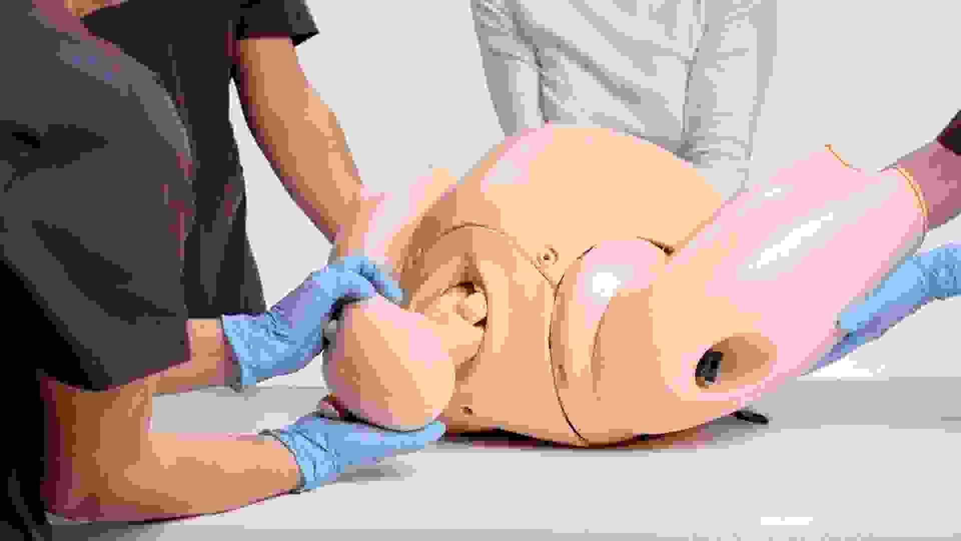 Birthing Simulator PROMPT Flex Standard version in light skin tone birth demonstration 